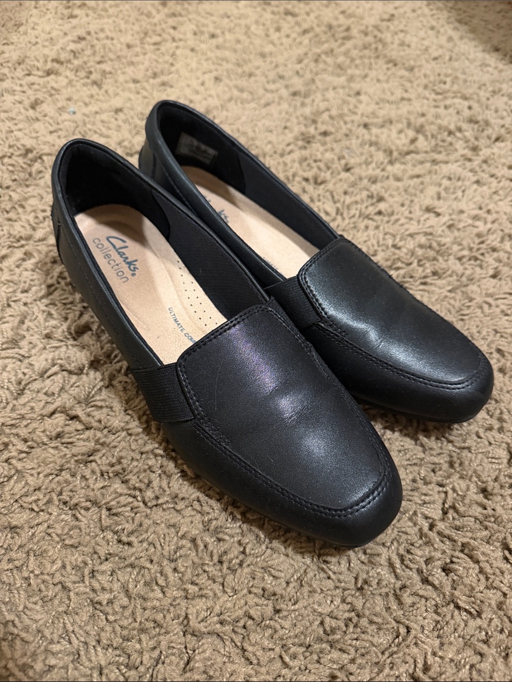 Woman’s Black Clarks Slip-On Loafers with short heel